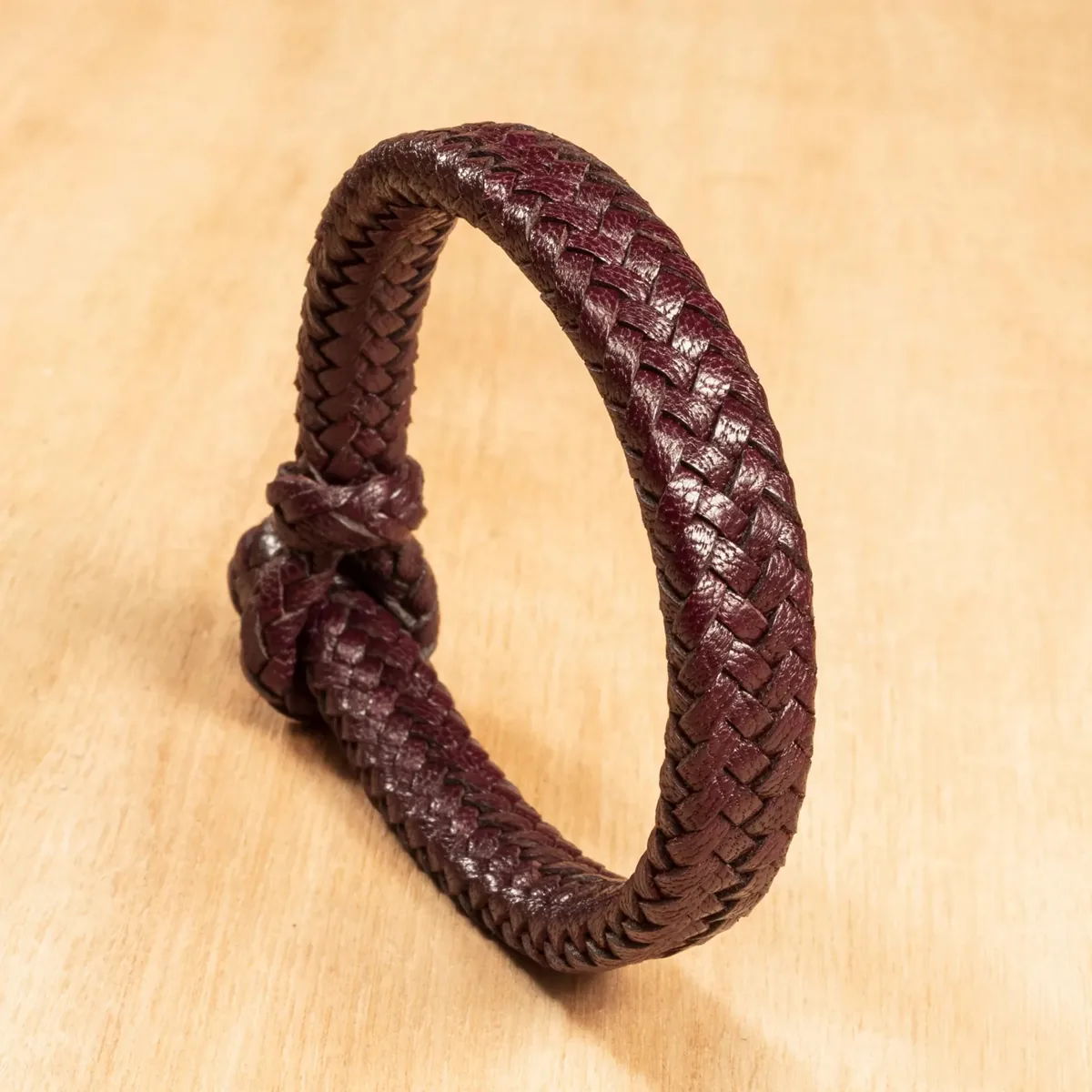 Burgundy 16-strand braided Chèvre goatskin leather bracelet with Gaucho knot closure